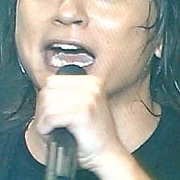 岡野さんの前歯に魅かれる。
