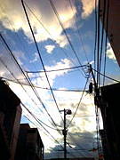 雲と空と電線がかさなった瞬間、